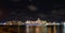 Miami, Florida, USA - MAY, 2020: Big white cruise ship docked at the port of Miami at night. Large luxury cruise ship on