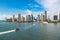 miami metropolis skyline with boat. photo of miami metropolis skyline with skyscrapers.