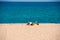 MIAMI PLATJA, SPAIN - APRIL 24, 2017: The man on the beach sunning. Copy space.