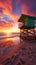 Miami\\\'s morning glow Lifeguard tower on South Beach\\\'s coastline under vibrant sunrise