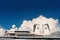 Miami, USA - December 31, 2015: upper decks and twin funnels of Eurodam. Facade of cruise ship on cloudy blue sky. Rows