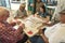 MIAMIA, FLORIDA - APRIL 29, 2015: Little Havana district in Miami and People playing Domino in Maximo Gomez Park Domino Park