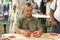 MIAMIA, FLORIDA - APRIL 29, 2015: Little Havana district in Miami and People playing Domino in Maximo Gomez Park Domino Park