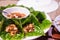 Miang kham or Savoury leaf wraps is a traditional Southeast Asian snack from Thailand