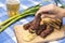 Mici cu bere traditional Romanian dish for celebrationg the 1st of May the labor day. Meet balls meat rolls dish and beer
