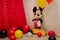 Mickey Mouse party. Character of Walt Disney cartoon with colorful balloons for children