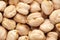 Micro Close up of Organic small chhole chana or Kabuli chana Cicer arietinum or whole white Bengal gram dal Full-Frame Backgroun