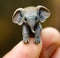 Micro Marvel: Tiny Elephant Perched on Finger - Generative AI Macro Shot