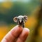 Micro Marvel: Tiny Elephant Perched on Finger - Generative AI Macro Shot