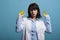 Microbiology laboratory expert holding petri dish plates with unknown bacteria