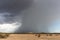 Microburst with heavy rain and storm clouds