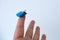 Microchip on finger of female hand on white background, research, development of microelectronics and processors, concept future