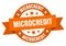 microcredit round ribbon isolated label. microcredit sign.