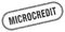 Microcredit stamp. rounded grunge textured sign. Label