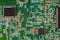 Microelectronic circuit board with components closeup.