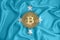 Micronesia flag, bitcoin gold coin on flag background. The concept of blockchain, bitcoin, currency decentralization in the