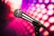 Microphone against purple background