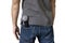 Microphone is in the back pocket of the jeans on white background and clipping path