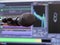 Microphone on the background of the computer monitor. Home recording Studio. Close-up. The focus in the foreground