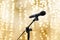 Microphone on blur gold yellow golden bokeh background beautiful romantic or luxury glitter lights circle soft pastel shade, Micro