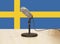 Microphone in front of a Swedish flag