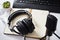 Microphone and headphones on the table, top view. Radio podcast workplace