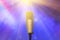 Microphone with led ighting background in concert hall