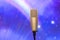 Microphone with led ighting background in concert hall