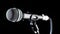 Microphone, mic, karaoke, concert, voice music. Vocal audio mic on a bleck background. Singer in karaokes, microphones