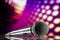 Microphone on purple background