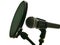 Microphone in recording studio for music, vocals, with pop filter.