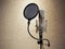 Microphone In Sound Recording Studio. Professional Microphone