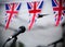 Microphone and union jack bunting at one of the concert stands at Garth Park, Bicester