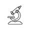 Microscope black and white vector icon