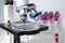 Microscope with test tube of micro biological for scientist biochemist