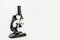 Microscope on white background