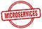 microservices stamp. microservices round grunge sign.