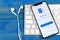 Microsoft Outlook office application icon on Apple iPhone X screen close-up. Microsoft outlook app icon. Microsoft OutLook applic