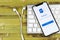 Microsoft Outlook office application icon on Apple iPhone X screen close-up. Microsoft outlook app icon. Microsoft OutLook applica