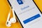 Microsoft Outlook office application icon on Apple iPhone X screen close-up. Microsoft outlook app icon. Microsoft OutLook applica