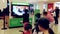 Microsoft staff demonstrates with children dance game
