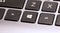 Microsoft Windows 10 OS key on a modern laptop keyboard, macro, closeup. Windows operating system brand logo, symbol