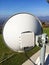 Microwave link transmission antenna dish on a telecommunication cellular network metal tower