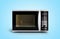 Microwave stove on blue gradient background 3d render