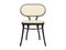 Mid-century bent beech-wood chair with woven cane backrest and seat. 3d render