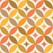 Mid century modern atomic starbursts on circle leaf seamless pattern in orange, brown and amber