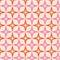 Mid century modern retro starbursts seamless pattern in pink, orange and white.