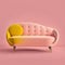 Mid century pink accent sofa on pink background