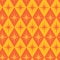 Mid Century Retro Starbursts on orange and amber diamond shapes seamless pattern