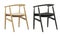 Mid-century wooden dining chairs with woven rope seat. 3d render